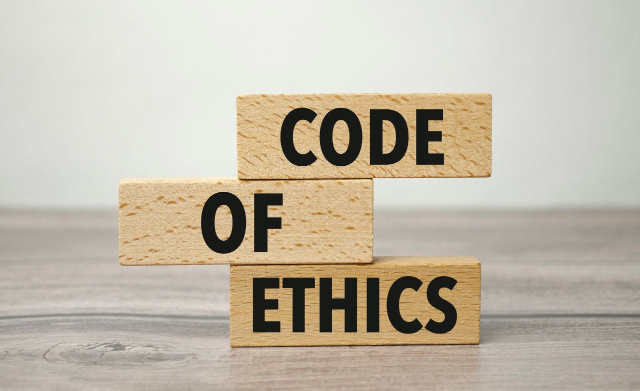 code of ethics written on wooden blocks