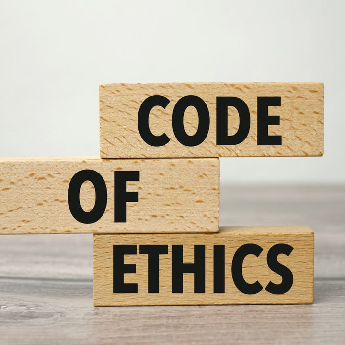 code of ethics written on wooden blocks